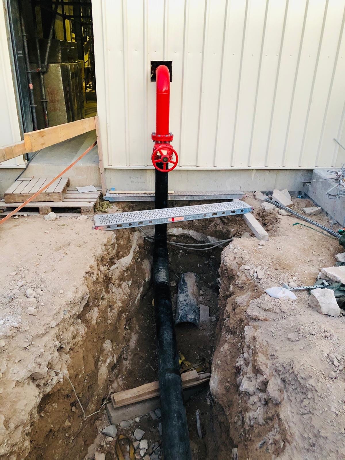 Fire suppression pipework near plant equipment