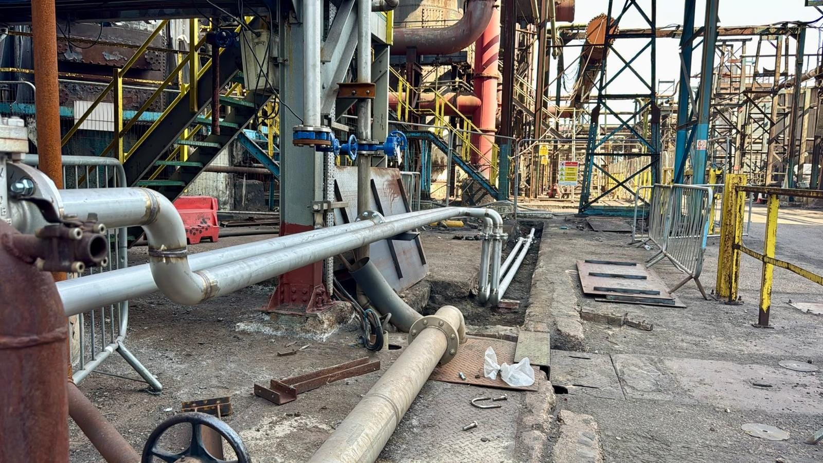 New pipework rising out of the low level pit and turning up into the coke oven plant structure