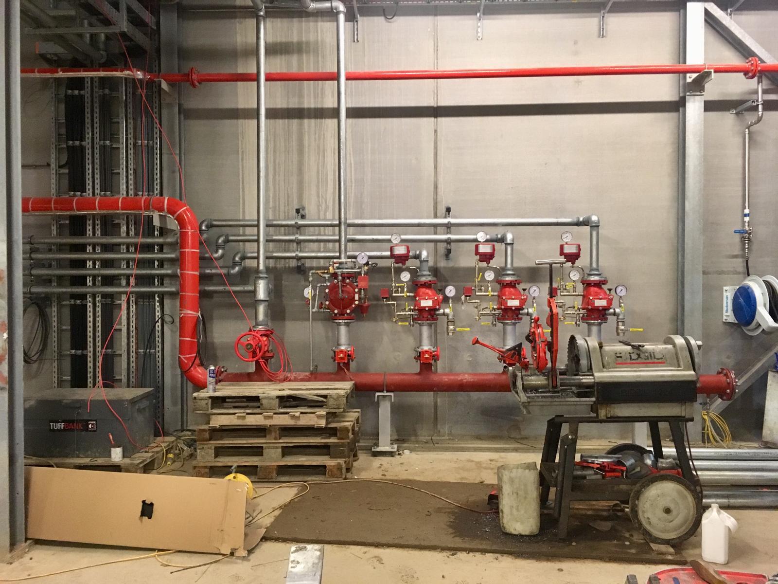 Process pipework runs installed through the biomass plant at Discovery Park