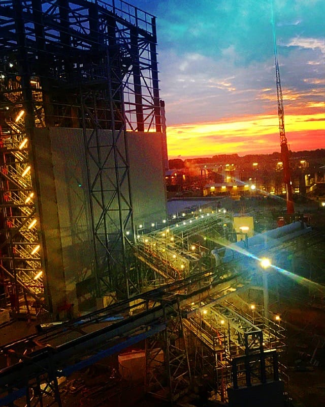 The Discovery Park site lit at dusk during the build